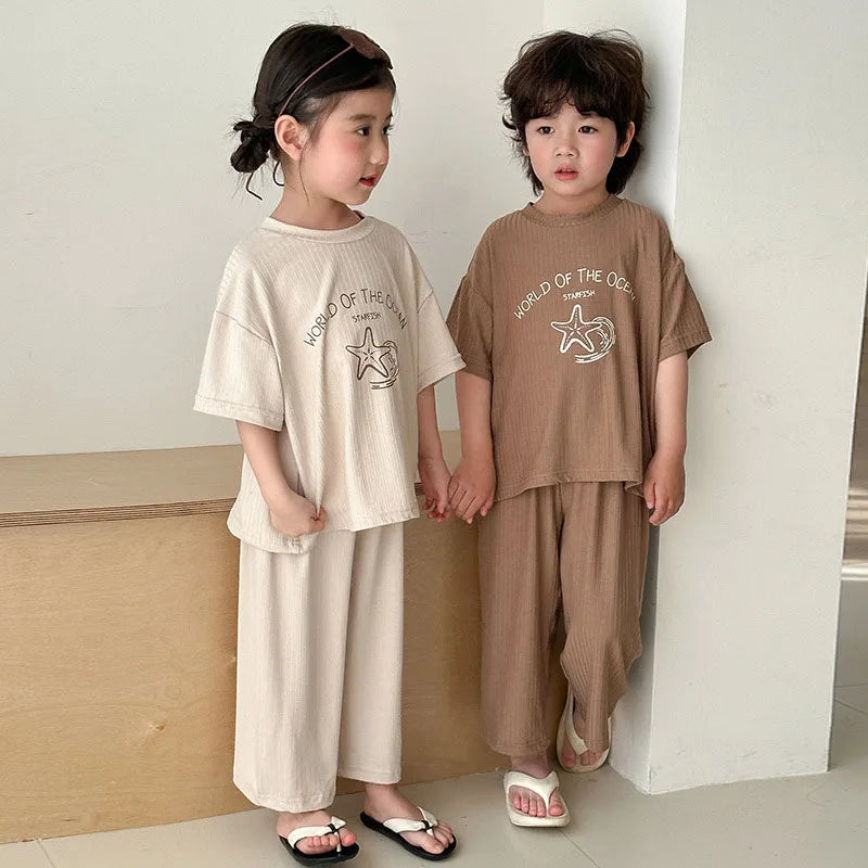 Pyjama Enfant Été “World of the Ocean” – Ensemble 2 Pièces en Coton Léger, Manches Courtes, Mixte