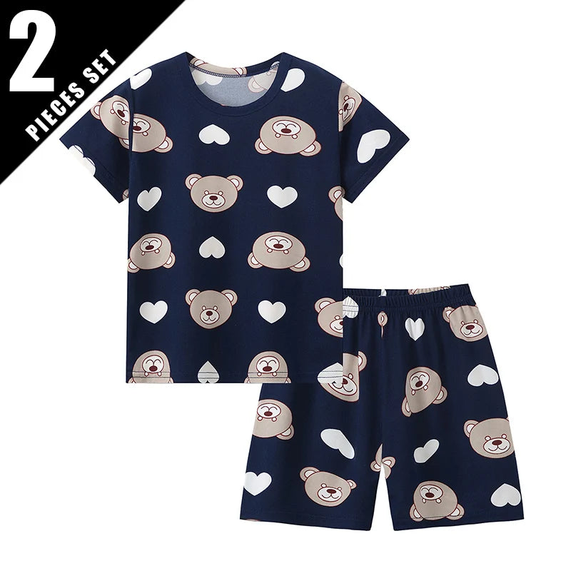 Pyjama Enfant Été “Cocon Instinctif” – Ensemble 2 Pièces en Coton Léger à Motifs Animaux, Manches Courtes