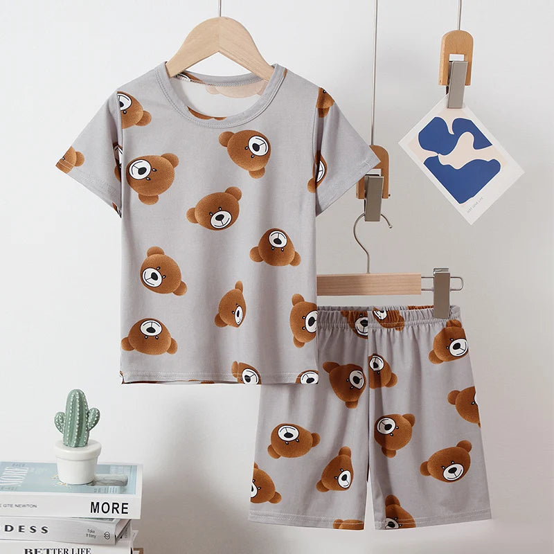 Pyjama Enfant Été “Cocon Instinctif” – Ensemble 2 Pièces en Coton Léger à Motifs Animaux, Manches Courtes