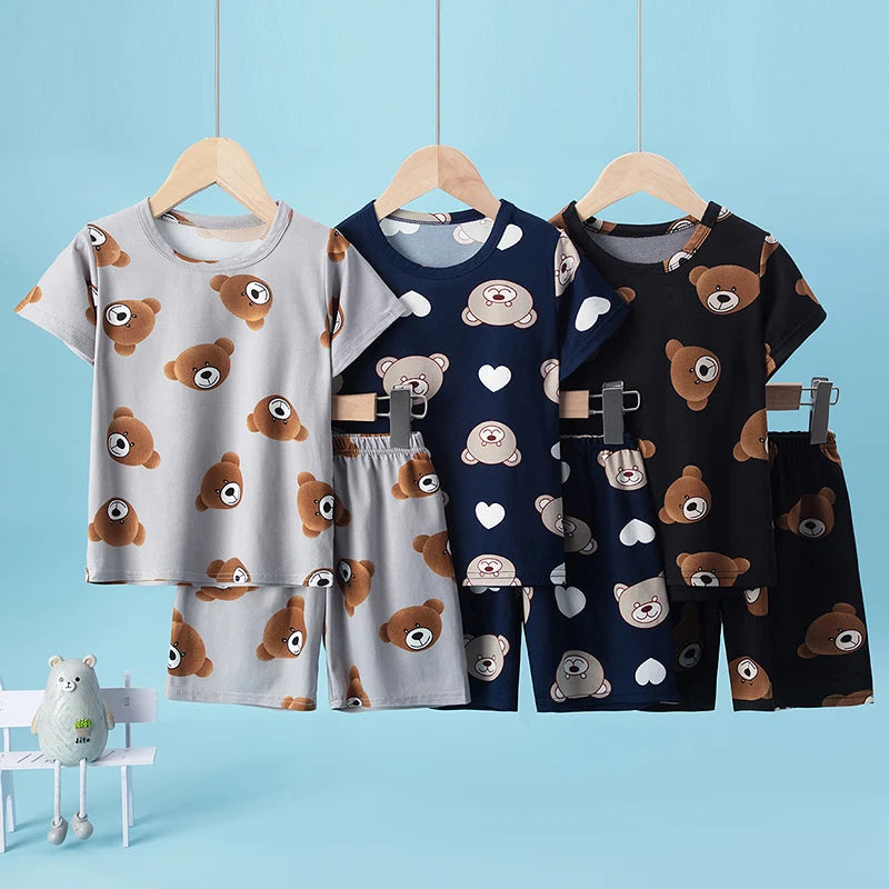 Pyjama Enfant Été “Cocon Instinctif” – Ensemble 2 Pièces en Coton Léger à Motifs Animaux, Manches Courtes