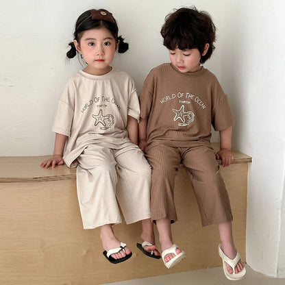 Pyjama Enfant Été “World of the Ocean” – Ensemble 2 Pièces en Coton Léger, Manches Courtes, Mixte